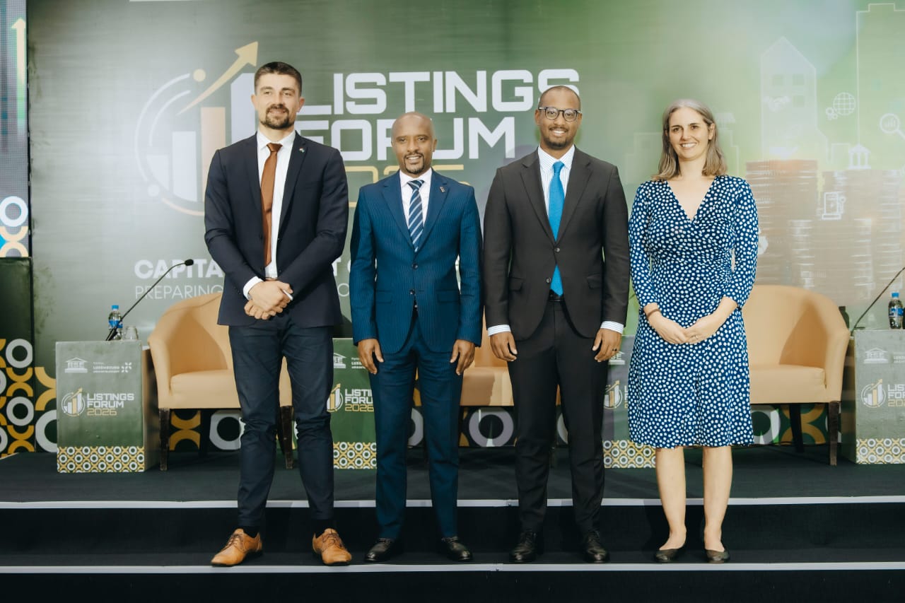 Rwanda Stock Exchange CEO Celestine Rwabukumba and Ministry of Trade and Industry Permanent Secretary Antoine Kajangwe with officials at the Exchange Listing Forum 2026